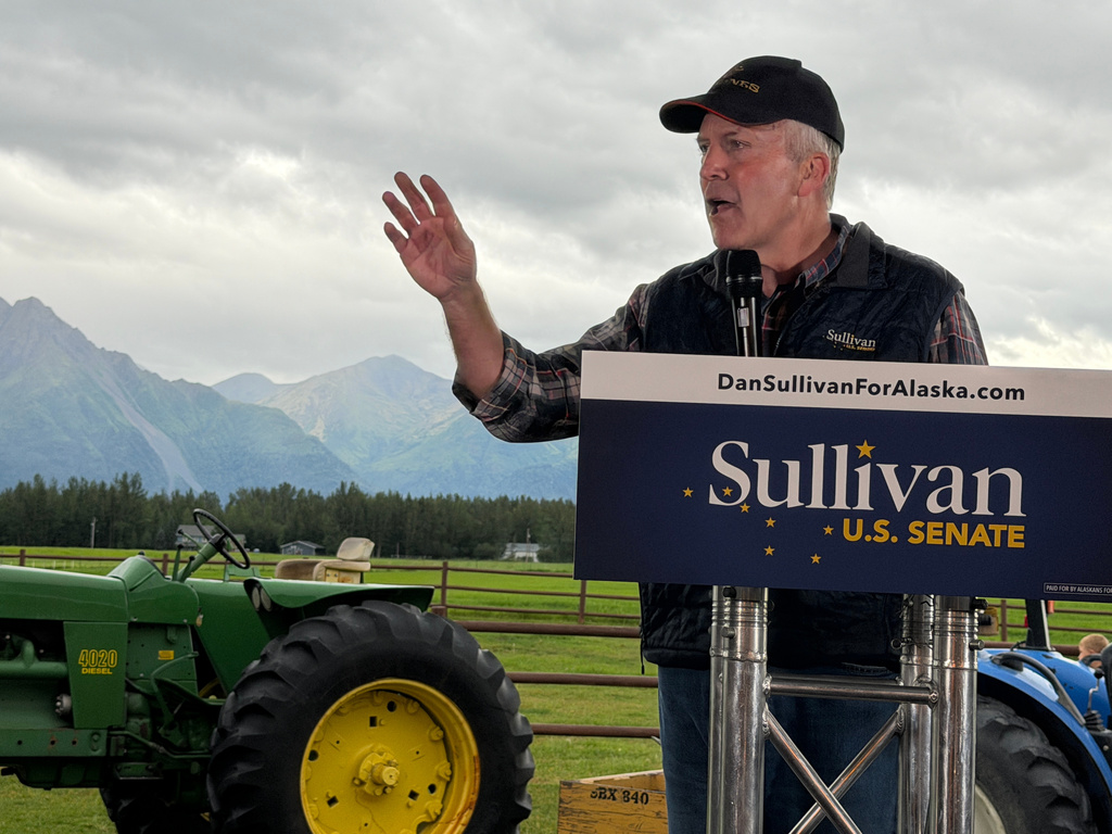 U.S. Sen. Dan Sullivan, R-Alaska, speaks at a get out the vote event held at farm in Palmer, Alaska, on Monday, Aug. 17, 2026. (AP Photo/Mark Thiessen)