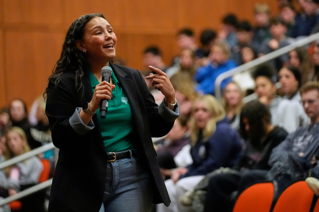 Keely Rogers, a trainer with Sandy Hook Promise's "Say Something" program, gives a presentation on preventing school shootings at Hanover High School, Wednesday, March 25, 2026, in Hanover, Mass. (AP Photo/Robert F. Bukaty)