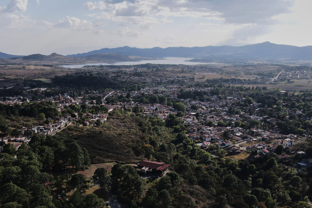 Trees and buildings dot Tapalpa, Mexico, Monday, Feb. 23, 2026, a day after the Mexican army killed Jalisco New Generation Cartel leader Nemesio Oseguera Cervantes, known as "El Mencho." (AP Photo/Marco Ugarte)