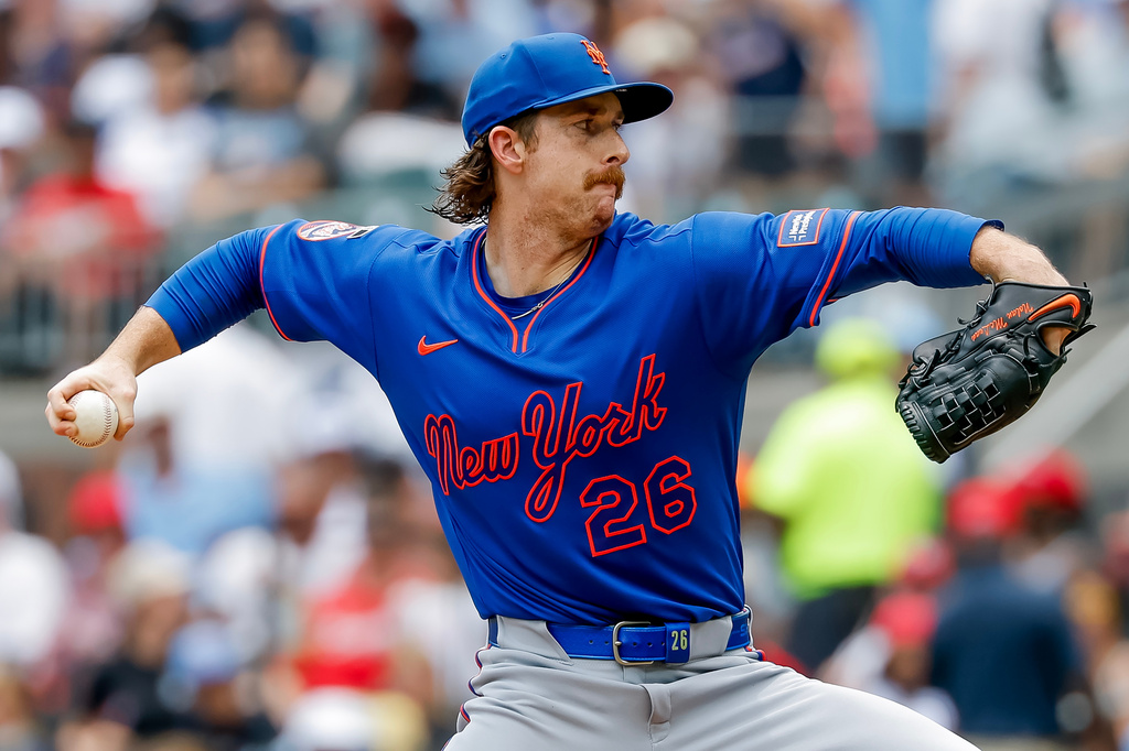 New York Mets pitcher Nolan McLean delivers to an Atlanta Braves batter during the first inning of a baseball game, Sunday, July 5, 2026, in Atlanta. (AP Photo/Erik S. Lesser)