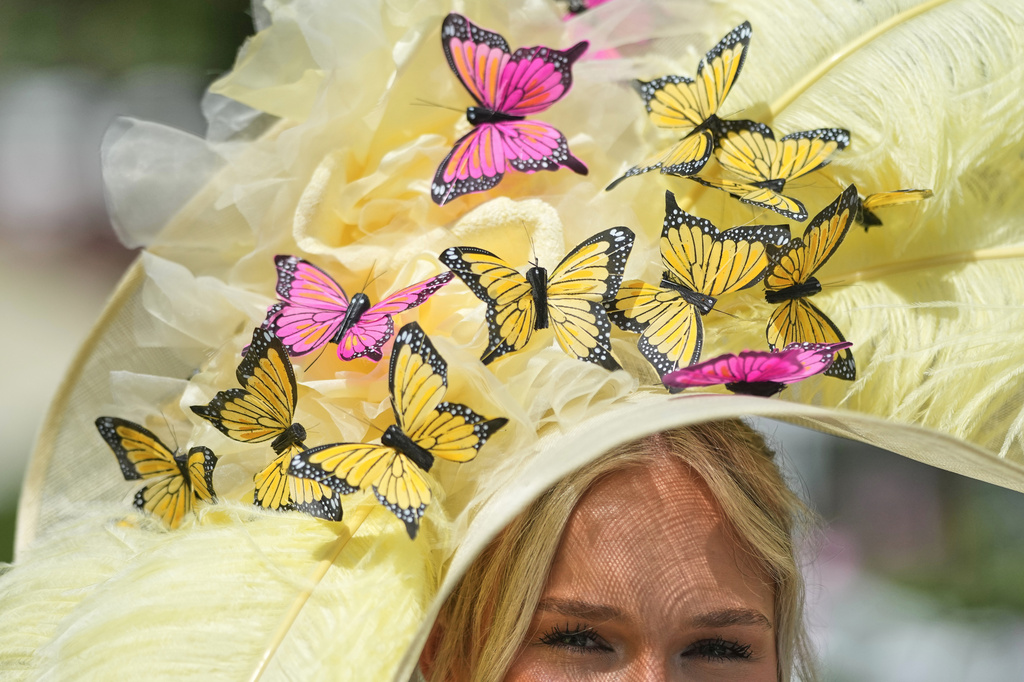 Racegoer Emily Bowen attends the third day of the Royal Ascot horse race meeting, traditionally called Ladies Day in Ascot, England, Thursday, June 18, 2026. (AP Photo/Alastair Grant)