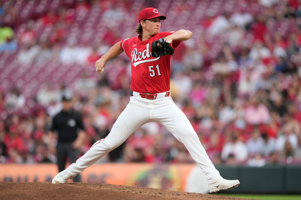 Cincinnati Reds pitcher Brady Singer throws during the third inning of a baseball game against the San Francisco Giants in Cincinnati, Tuesday, April 14, 2026. (AP Photo/Carolyn Kaster)