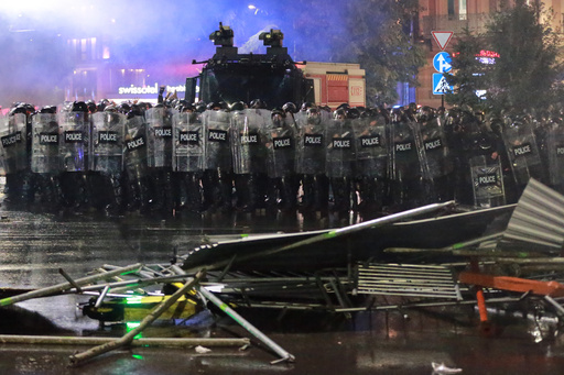 Police block a street to prevent demonstrators from advancing during an opposition rally in the city center of Tbilisi, Georgia, on Saturday, Oct. 4, 2025, as they boycott the municipal elections and call for the release of political opponents. (AP Photo/Zurab Tsertsvadze) Police block a street to prevent demonstrators from advancing during an opposition rally in the city center of Tbilisi, Georgia, on Saturday, Oct. 4, 2025, as they boycott the municipal elections and call for the release of political opponents. (AP Photo/Zurab Tsertsvadze)
