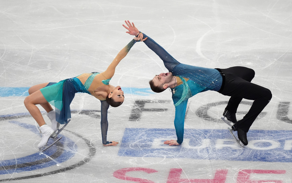 Georgia's Anastasiia Metelkina and Luka Berulava compete during the Pairs Free Skating on day two of the ISU European Figure Skating Championships in Sheffield, England, Thursday, Jan. 15, 2026. (Mike Egerton/PA via AP)