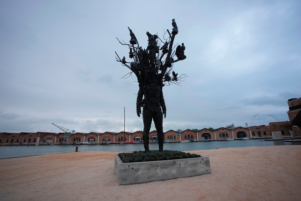 The installation 'Amalgam' by the artist Nick Cave is visible at the Arsenale at the Venice 2026 Biennale Art, in Venice, Italy, Tuesday, May, 5, 2026. (AP Photo/Luca Bruno)