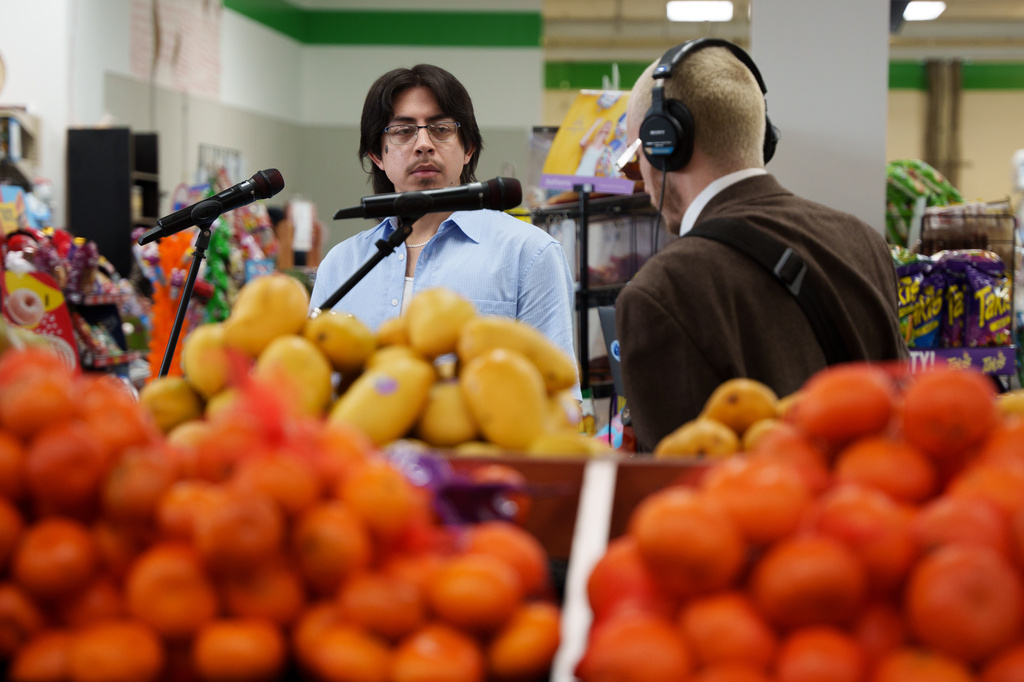 Luna Luna band members Kevin Gonzalez and Caleb Powers perform in the produce section of Fiesta Fresh Market in New Castle, Del., on Sunday, April 26, 2026. (AP Photo/Mingson Lau)