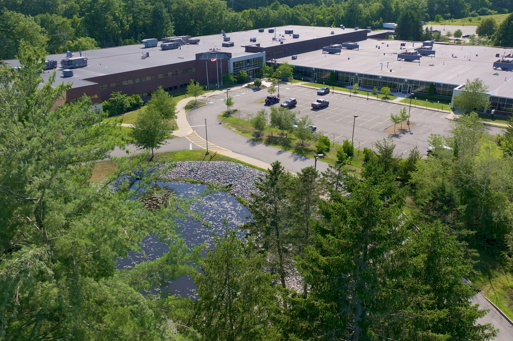 This image taken from video shows an office park that is home to Phoenix Tailings' rare earth metal refinery Friday, July 17, 2026, in Exeter, N.H. (AP Photo/Rodrique Ngowi)