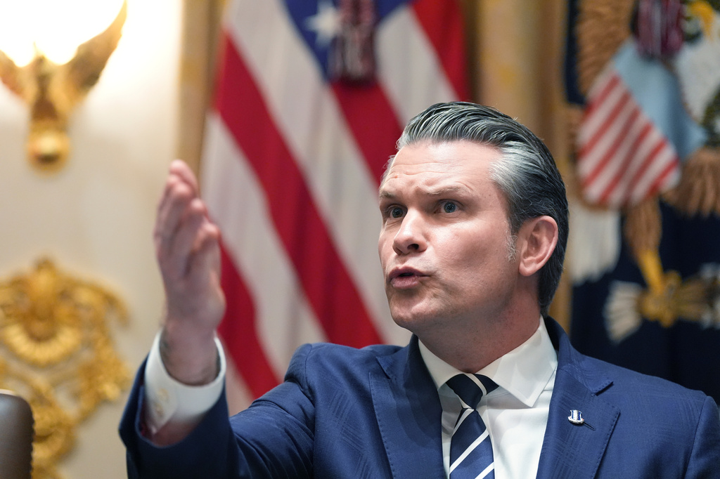 Defense Secretary Pete Hegseth speaks during a Cabinet meeting at the White House, Thursday, March 26, 2026, in Washington. (AP Photo/Alex Brandon)