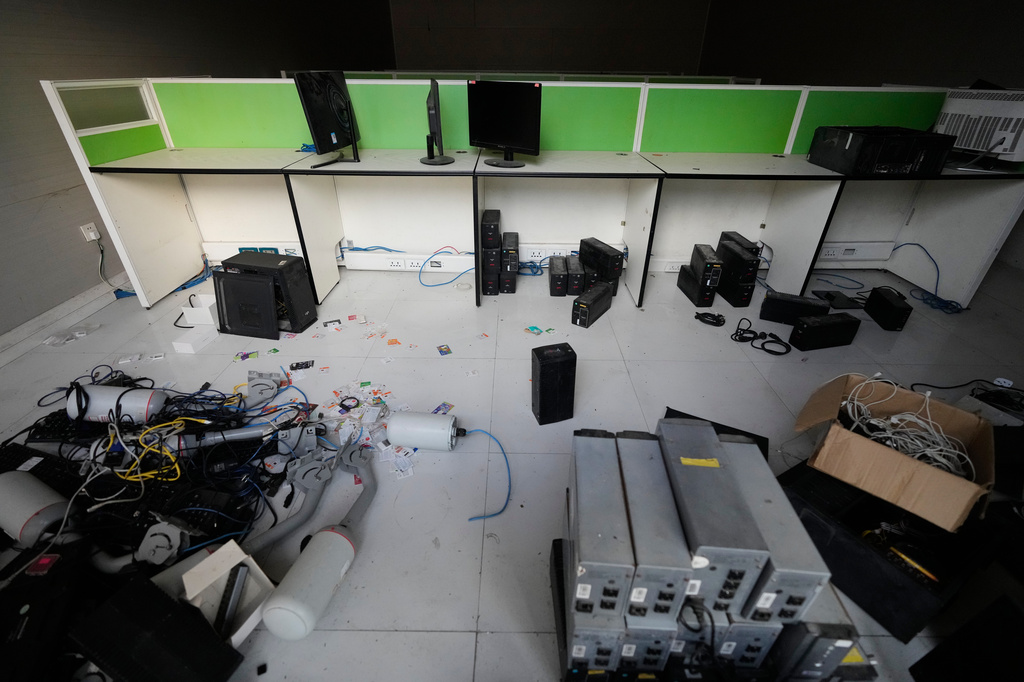 SIM cards and computer accessories remain at the sprawling former Baofu scam compound that was raided by authorities last year in Bamban, Tarlac city, northern Philippines, Thursday, June 5, 2025. (AP Photo/Aaron Favila)