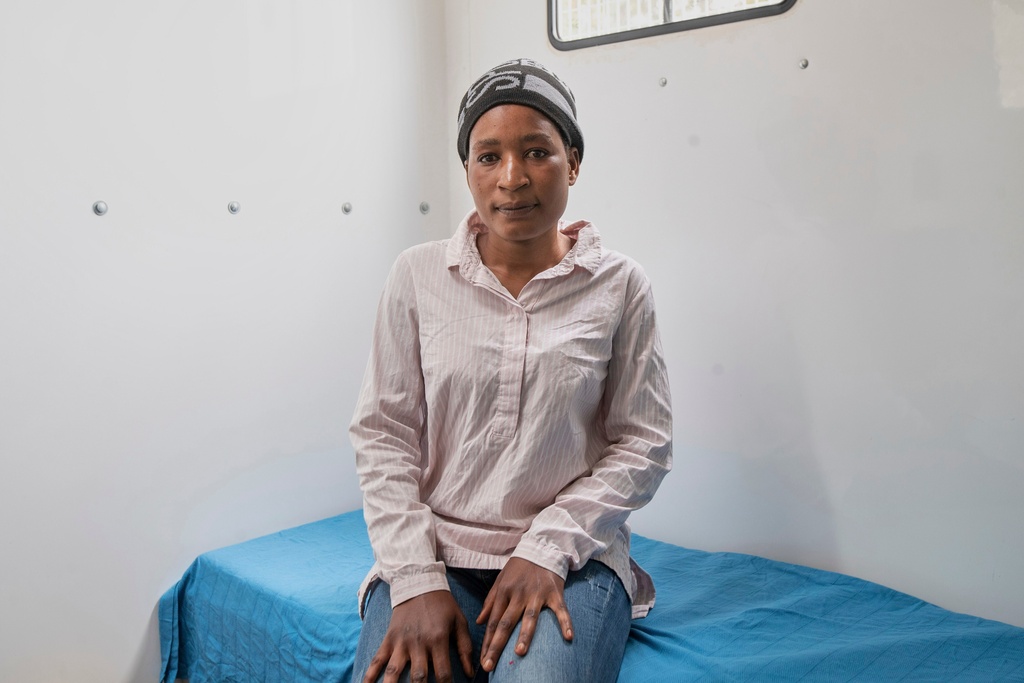 Constance Mukoloka sits inside a consulting room as she waiting to receive an injection of the new HIV prevention drug lenacapavir, in Harare, Zimbabwe, Thursday, Feb. 19, 2026. (AP Photo/Aaron Ufumeli)