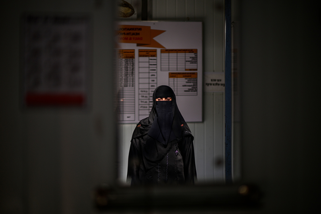 Noor Kaida, a 17-year-old Rohingya refugee, poses inside the Rohingya refugee camp in Cox's Bazar, Bangladesh, Sunday, Nov. 23, 2025. (AP Photo/Mahmud Hossain Opu)