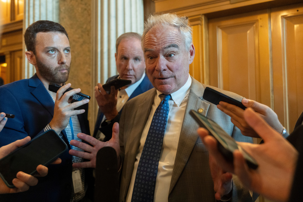 Sen. Tim Kaine, D-Va. speaks to reporters at the Capitol, Wednesday, Oct. 1, 2025, in Washington. (AP Photo/Manuel Balce Ceneta)