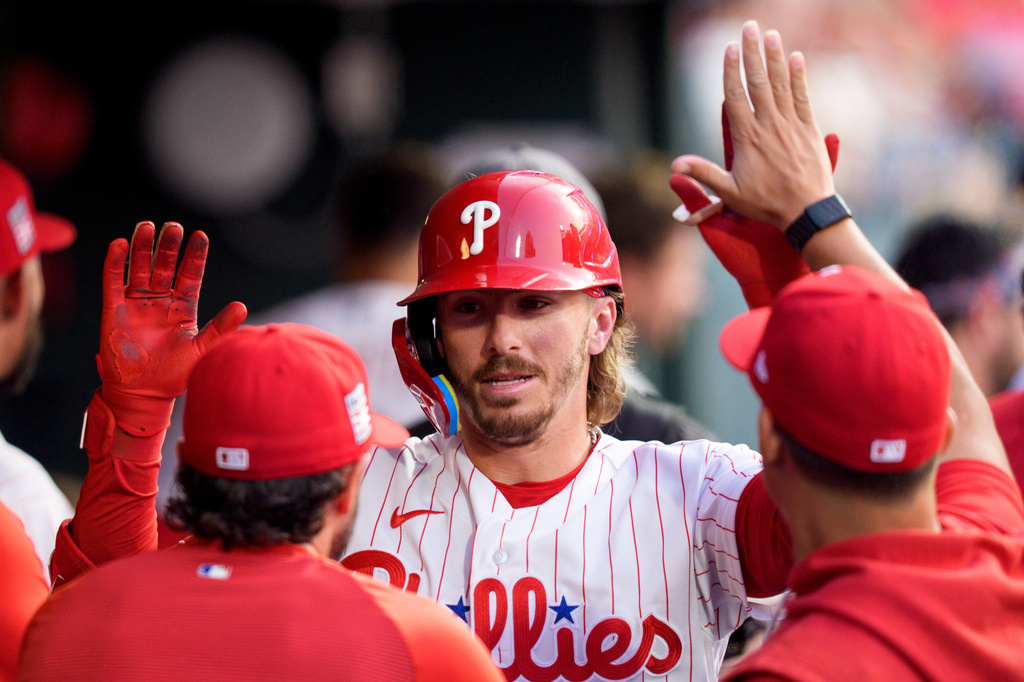 Philadelphia Phillies' Bryson Stott celebrates with teammates after his home run during the second inning of a baseball game against the New York Yankees, Sunday, July 26, 2026, in Philadelphia. (AP Photo/Chris Szagola)
