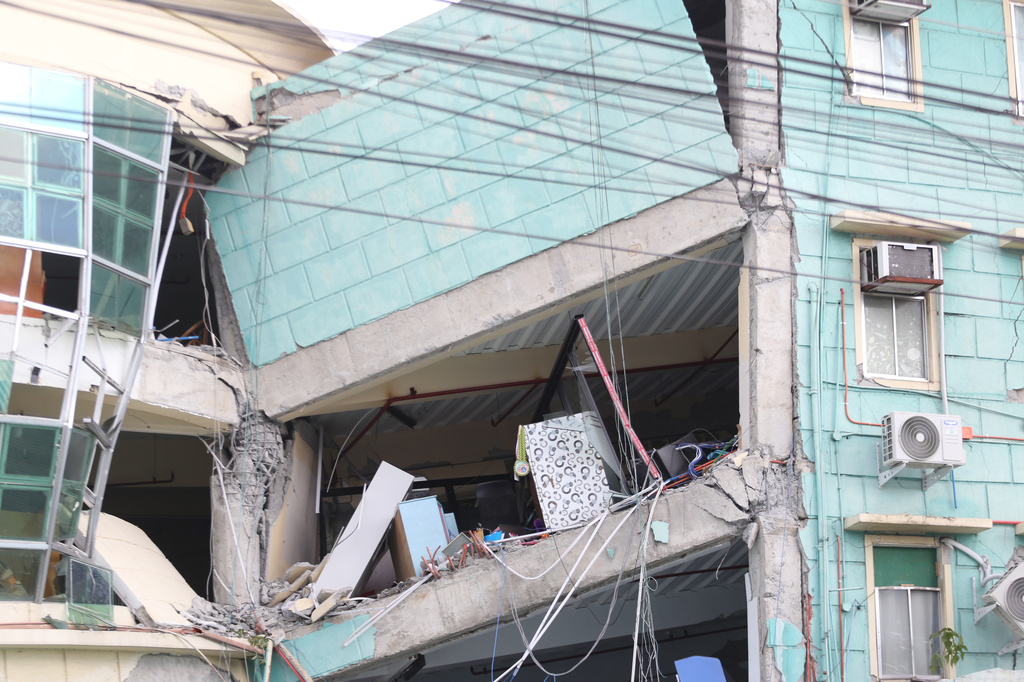 A building is damaged after an earthquake in General Santos, Philippines, Monday, June 8, 2026. (AP Photo)