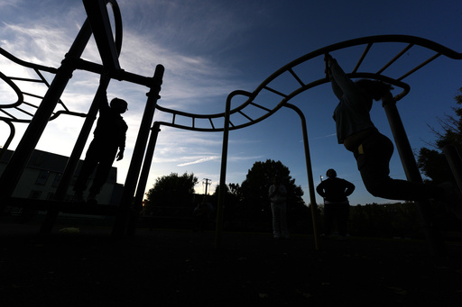 Children play on the monkey bars outside Funston Elementary School as night falls, in Chicago's Logan Square neighborhood, Thursday, Oct. 16, 2025. (AP Photo/Rebecca Blackwell) Children play on the monkey bars outside Funston Elementary School as night falls, in Chicago's Logan Square neighborhood, Thursday, Oct. 16, 2025. (AP Photo/Rebecca Blackwell)