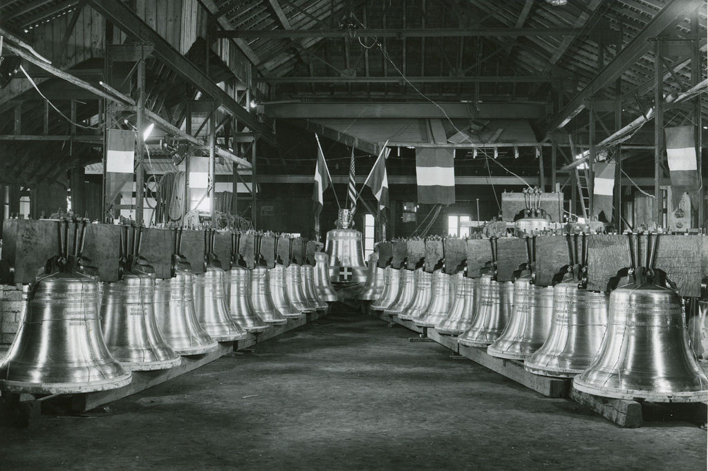 This 1950 photo provided by Paccard Foundry shows rows of replica Liberty Bells, ordered by the U.S. Treasury for a savings bond drive, as they await shipment at the Paccard Foundry in Lac d'Annecy, France. (Paccard Archives/Paccard Foundry via AP)