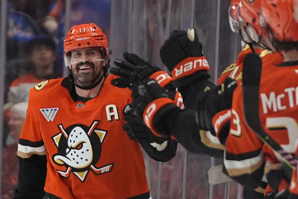 Anaheim Ducks left wing Alex Killorn celebrates his goal with teammates during the second period of an NHL hockey game against the New York Rangers Monday, Jan. 19, 2026, in Anaheim, Calif. (AP Photo/Gregory Bull)