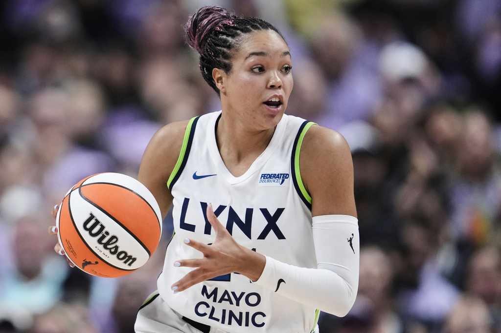 FILE - Minnesota Lynx forward Napheesa Collier moves the ball during the first half of Game 2 in the first round of the WNBA basketball playoffs against the Golden State Valkyries, Wednesday, Sept. 17, 2025, in San Jose, Calif. (AP Photo/Godofredo A. Vásquez, File)