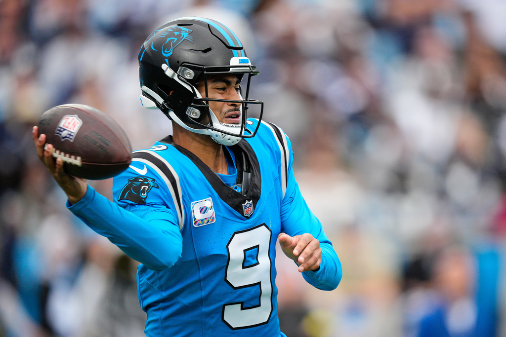 Carolina Panthers quarterback Bryce Young throws a pass in the second half of an NFL football game against the Dallas Cowboys, Sunday, Oct. 12, 2025, in Charlotte, N.C. (AP Photo/Jacob Kupferman)