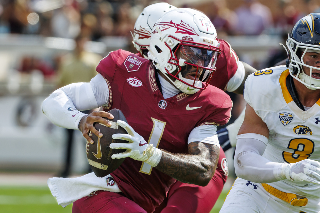 Florida State quarterback Tommy Castellanos (1) runs for a touchdown during the first half of an NCAA college football game against Kent State, Saturday, Sept. 20, 2025, in Tallahassee, Fla. (AP Photo/Colin Hackley)