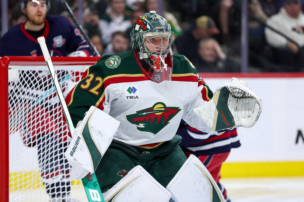 Minnesota Wild goaltender Filip Gustavsson (32) defends his net against the Winnipeg Jets during the second period of an NHL hockey game Tuesday, Oct. 28, 2025, in St. Paul, Minn. (AP Photo/Matt Krohn)