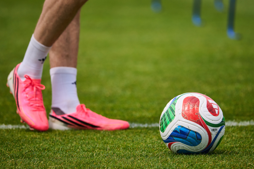 A Canadian flag is seen on a FIFA soccer ball during a World Cup soccer training session in Toronto, Tuesday, June 9, 2026. (Sammy Kogan/The Canadian Press via AP)