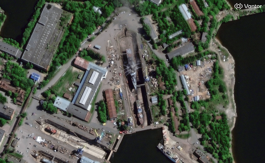This satellite image provided by Vantor shows fire crews working to control the fires onboard the Russian guided-missile corvette Boikiy at the Kronstadt naval base, west of St. Petersburg, Russia, Wednesday, June 3, 2026. (Satellite image ©2026 Vantor via AP)
