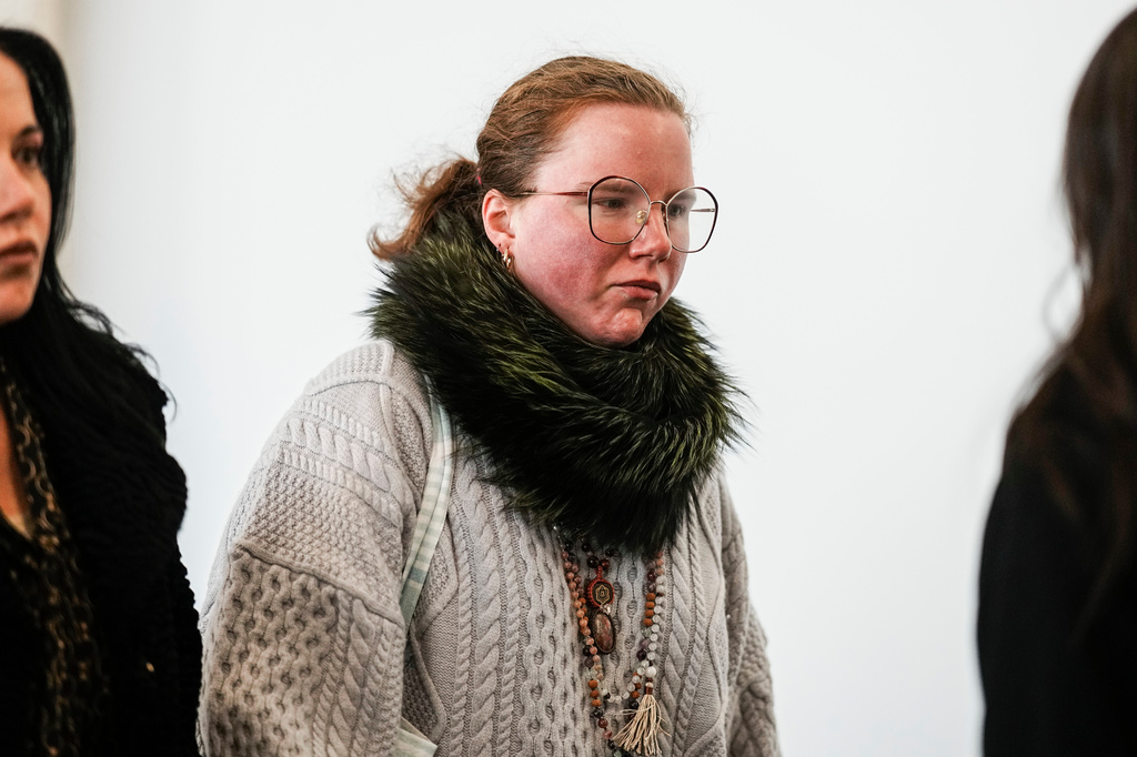 Victoria Heuermann walks to the courtroom as Rex Heuermann, accused in Long Island's infamous Gilgo Beach serial killings, is expected to plead guilty, Wednesday, April 8, 2026, at Suffolk County Court in Riverhead, N.Y. (AP Photo/Eduardo Munoz Alvarez)