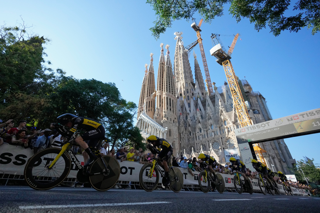 Team Visma in action during the first stage of the Tour de France cycling race, a team time-trial over 19.6 kilometers (11.8 miles) with start and finish in Barcelona, Spain, Saturday, July 4, 2026. (AP Photo/Mosa'ab Elshamy)