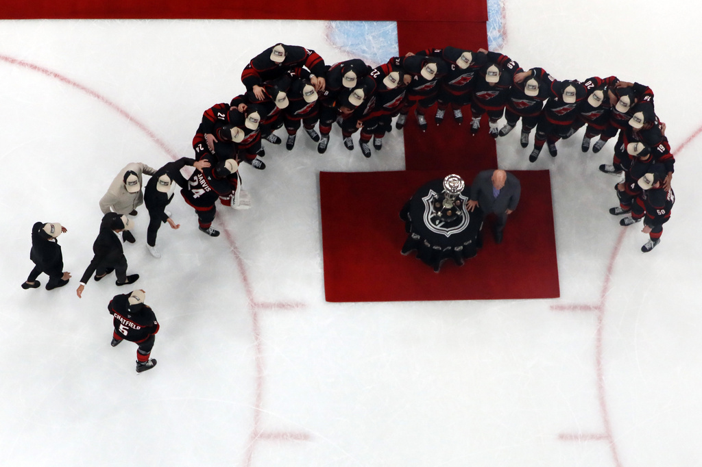 The Carolina Hurricanes accept the Prince of Wales Trophy following Game 5 of the Eastern Conference finals NHL hockey Stanley Cup playoff series against the Montreal Canadiens in Raleigh, N.C., Friday, May 29, 2026. (AP Photo/Karl DeBlaker)