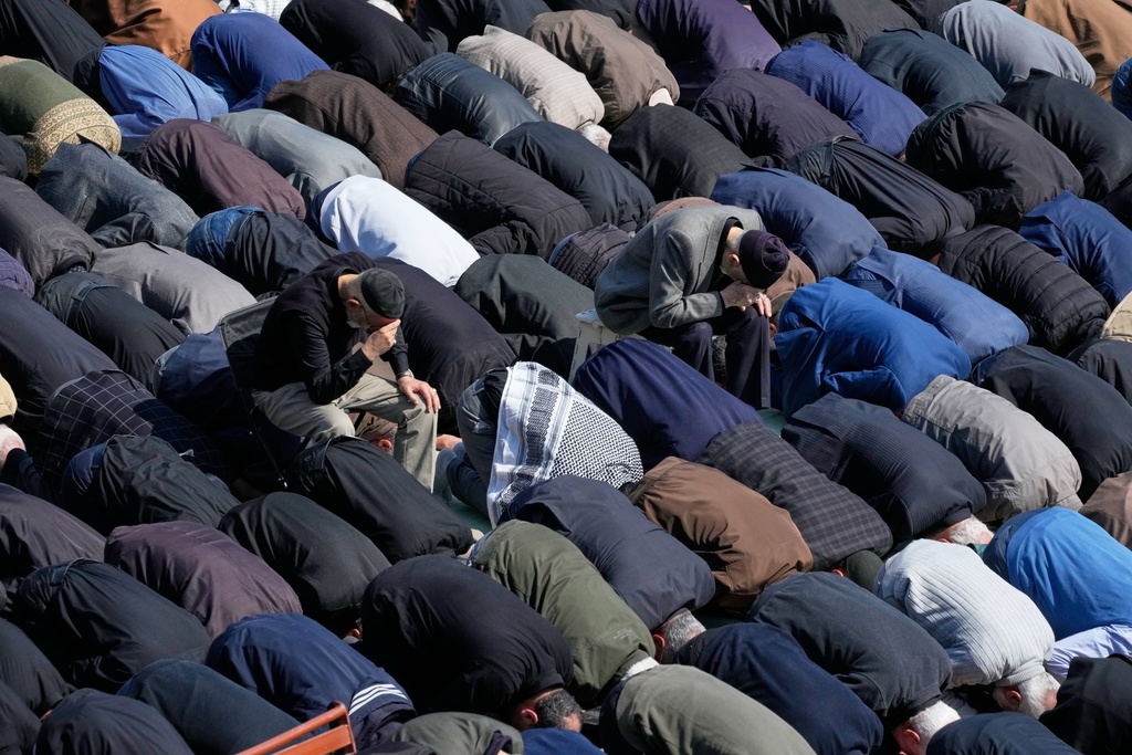 Iranians attend Friday prayers at the Imam Khomeini Grand mosque in Tehran, Iran, Friday, March 6, 2026. (AP Photo/Vahid Salemi)