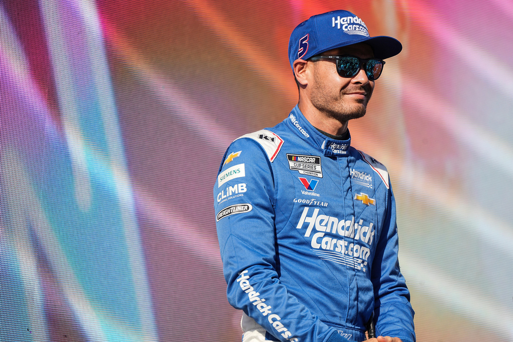 FILE - Kyle Larson looks on prior to a NASCAR Cup Series auto race at Darlington Raceway, Aug. 31, 2025, in Darlington, S.C. (AP Photo/Matt Kelley, File)