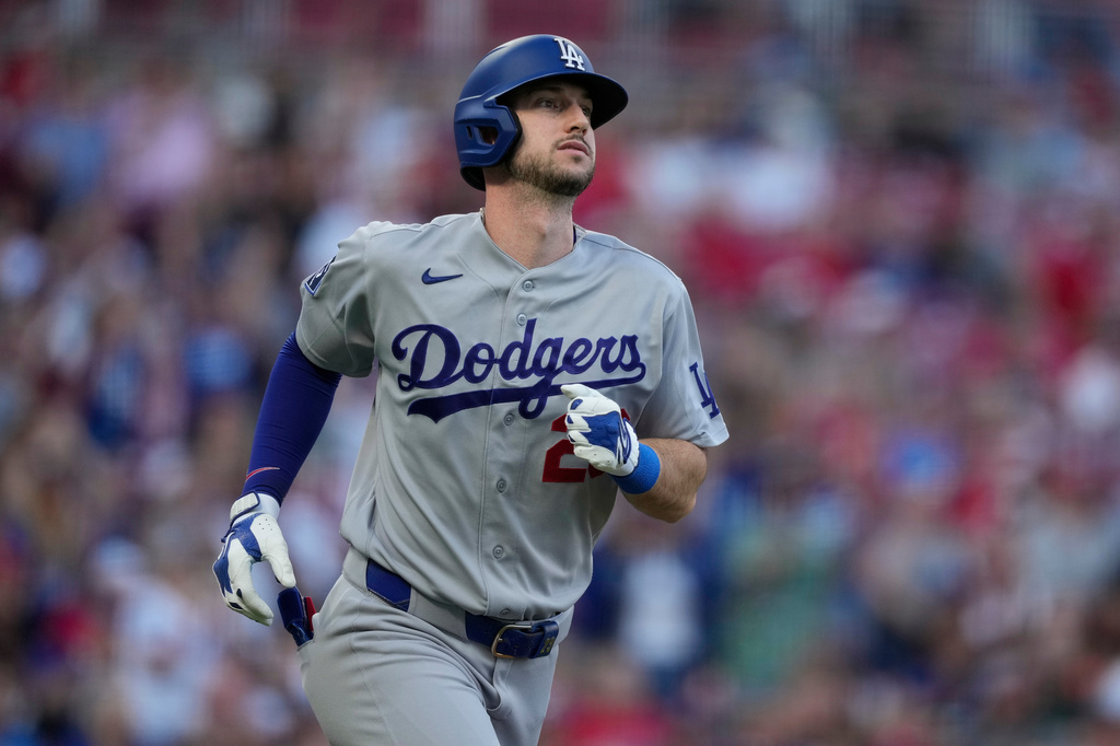 Los Angeles Dodgers right fielder Kyle Tucker rounds the bases after hitting a solo home run during the second inning of a baseball game against the Cincinnati Reds, Monday, Sept. 14, 2026, in Cincinnati. (AP Photo/Carolyn Kaster)