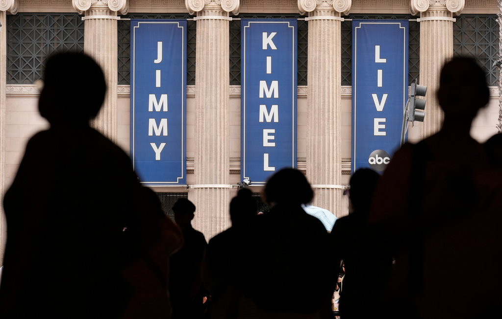 FILE - People walk by the Jimmy Kimmel Live studio on Hollywood Blvd., Wednesday, Sept. 17, 2025, in Los Angeles. (AP Photo/Chris Pizzello, File)