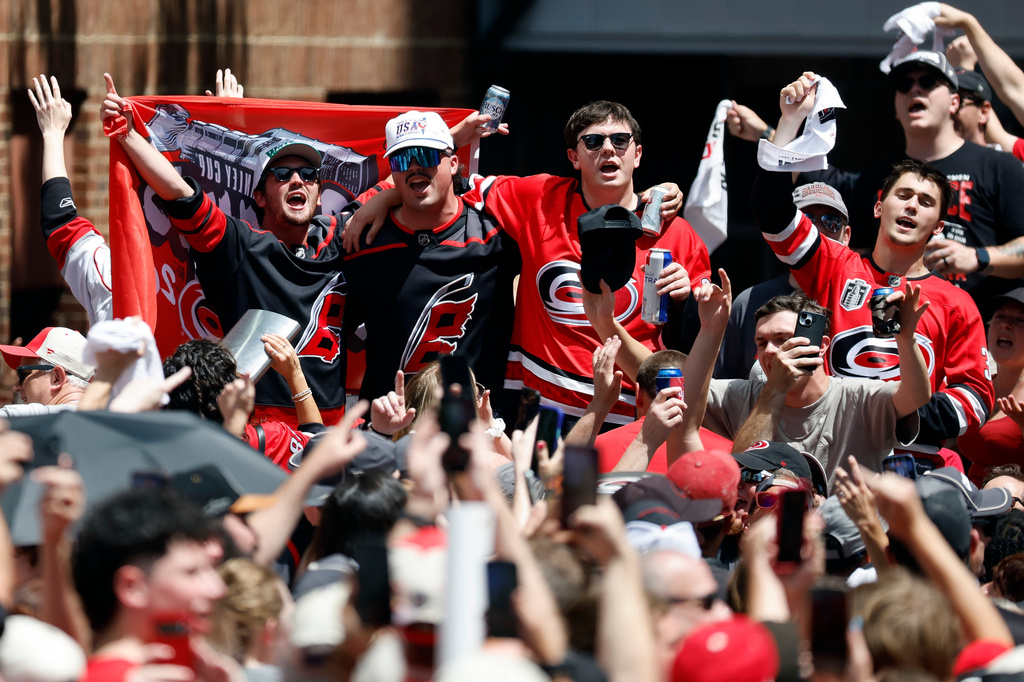 Carolina Hurricanes fans celebrate during the Stanley Cup Championship celebration in Raleigh, N.C., Saturday, June 20, 2026. (AP Photo/Karl DeBlaker)
