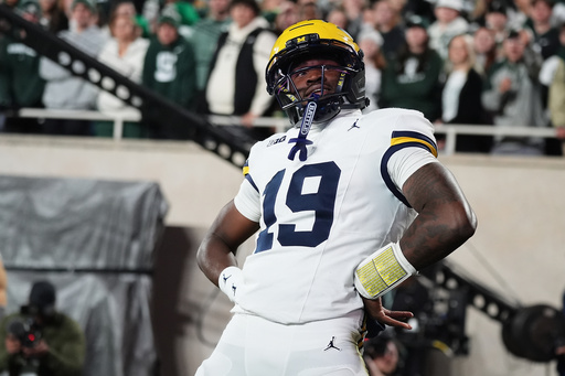 Michigan quarterback Bryce Underwood celebrates after scoring a touchdown during the first half of an NCAA college football game against Michigan State Saturday, Oct. 25, 2025, in East Lansing, Mich. (AP Photo/Ryan Sun) Michigan quarterback Bryce Underwood celebrates after scoring a touchdown during the first half of an NCAA college football game against Michigan State Saturday, Oct. 25, 2025, in East Lansing, Mich. (AP Photo/Ryan Sun)