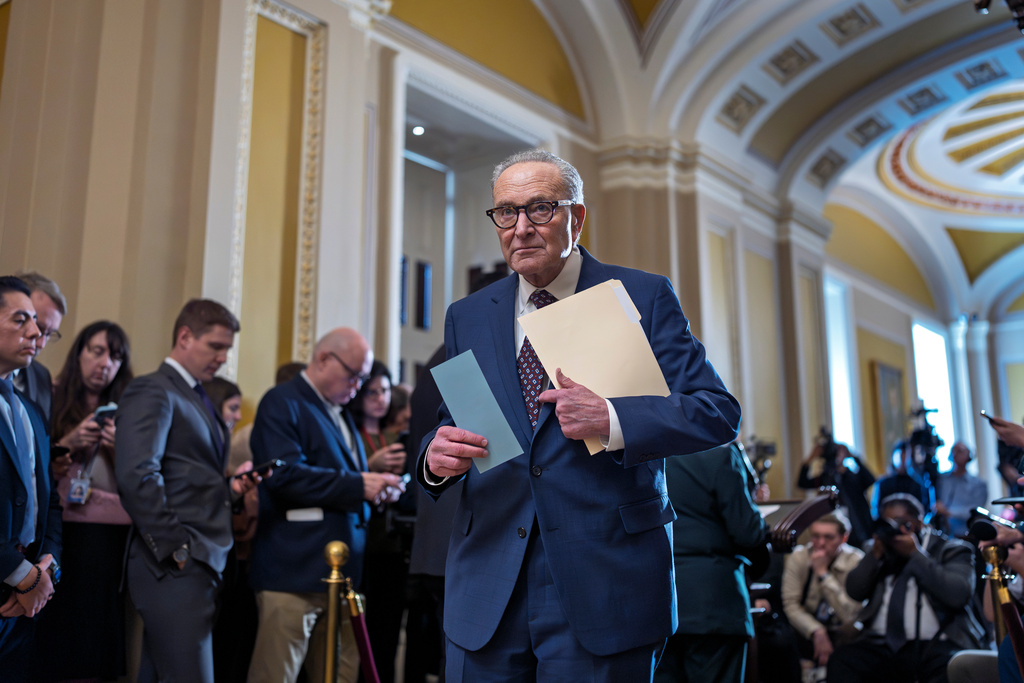 Senate Minority Leader Chuck Schumer, D-N.Y., waits to speak to reporters following a closed-door meeting with fellow Democrats at the Capitol in Washington, Wednesday, Jan. 28, 2026. (AP Photo/J. Scott Applewhite)