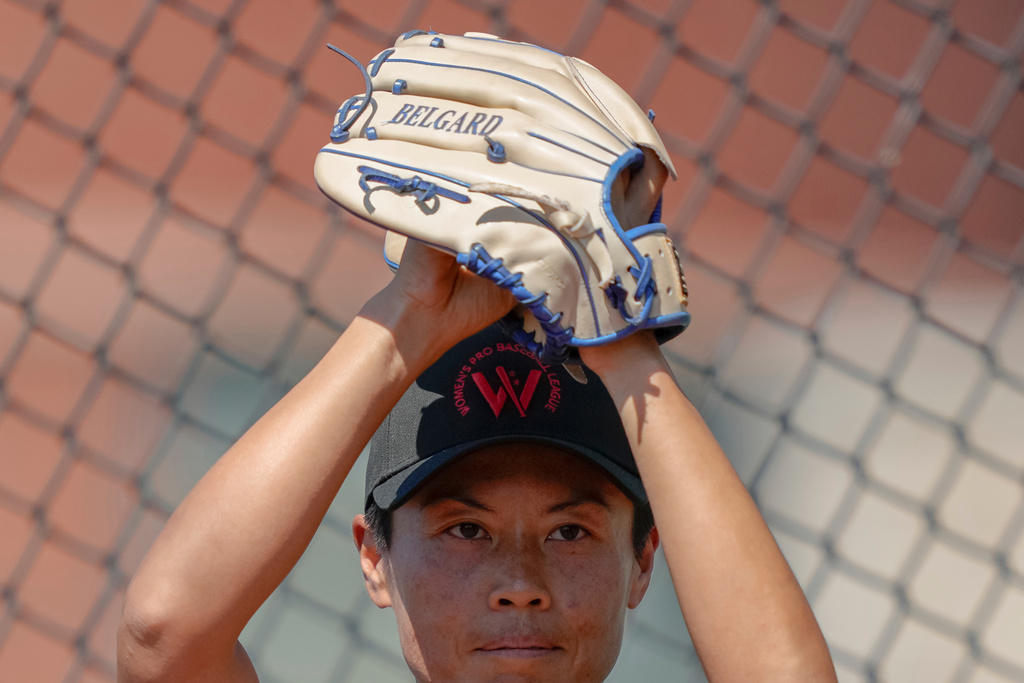 FILE - Ayami Sato pitches during the second day of tryouts for the Women's Professional Baseball League, Aug. 23, 2025, at the Washington Nationals Youth Baseball Academy in Washington. (AP Photo/Julia Demaree Nikhinson, File)