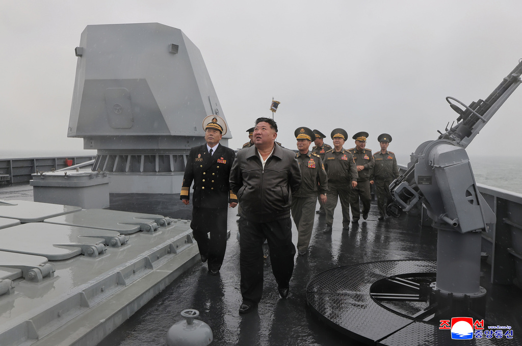 In this photo provided on May 8, 2026, by the North Korean government, its leader Kim Jong Un, center, visits the destroyer Choe Hyon to review its maneuverability off North Korea's west coast, Thursday, May 7, 2026. Independent journalists were not given access to cover the event depicted in this image distributed by the North Korean government. The content of this image is as provided and cannot be independently verified. Korean language watermark on image as provided by source reads: "KCNA" which is the abbreviation for Korean Central News Agency. (Korean Central News Agency/Korea News Service via AP)