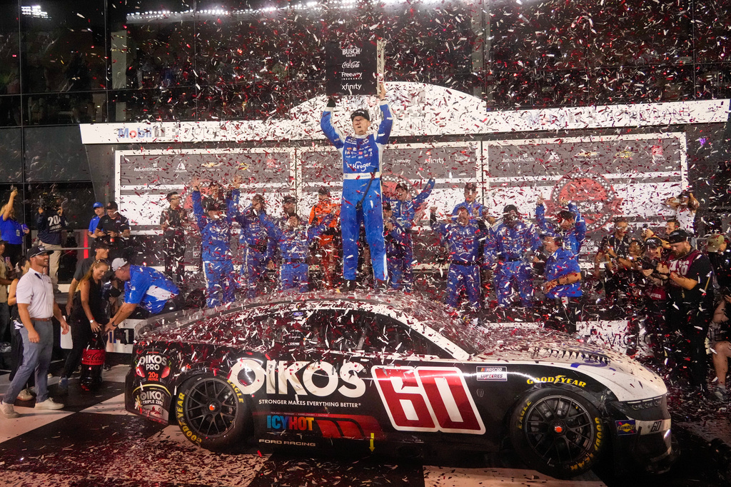 Ryan Preece, center, celebrates after winning a NASCAR Cup Series auto race at Daytona International Speedway, Saturday, Aug. 29, 2026, in Daytona Beach, Fla. (AP Photo/John Raoux)