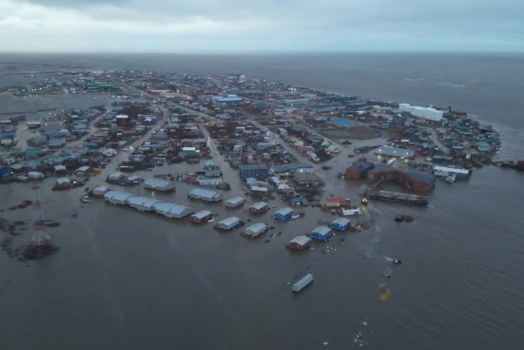 In this aerial photo provided by the Alaska Department of Transportation and Public Facilities, the city of Kotzebue, Alaska experiences flooding, Wednesday, Oct. 8, 2025. (Alaska Department of Transportation and Public Facilities via AP)
