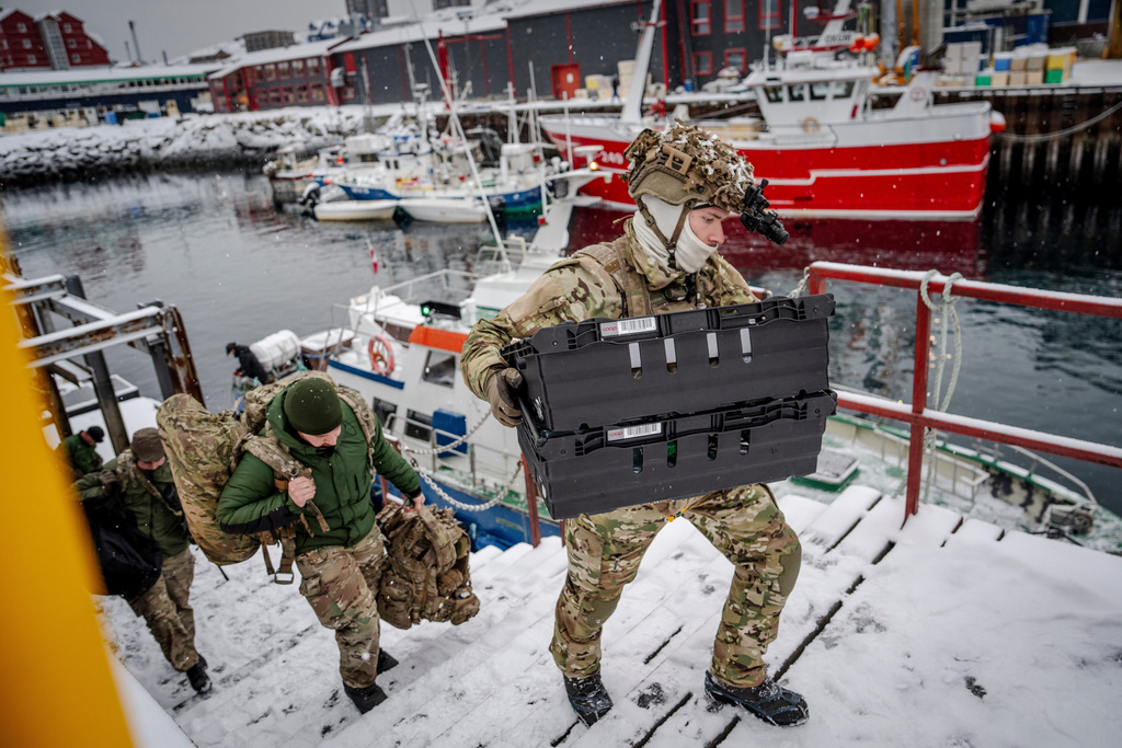 Danish soldiers disembark at the harbor in Nuuk, Greenland, on Sunday, Jan. 18, 2026. (Mads Claus Rasmussen/Ritzau Scanpix via AP)