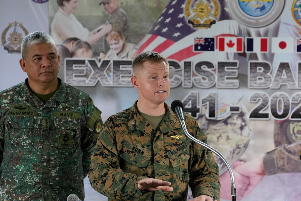 U.S. Col. Robert Bunn, right, speaks beside Philippine Navy Col. Dennis Hernandez during a press conference for the upcoming joint military exercise dubbed "Balikatan" or "Shoulder to Shoulder" at Camp Aguinaldo military headquarters on Tuesday, April 14, 2026, in Quezon city, Philippines. (AP Photo/Aaron Favila)
