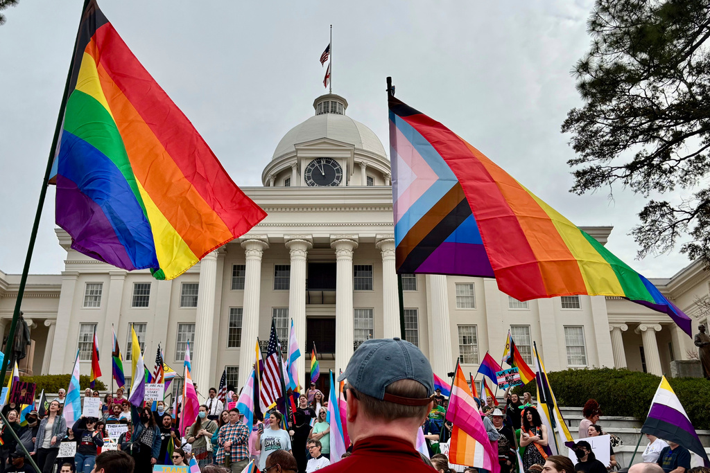 FILE - Demonstrators march to the Alabama Capitol in Montgomery, Ala., on Feb. 5, 2025 to protest bills that would impact transgender people. (AP Photo/Kim Chandler, file)