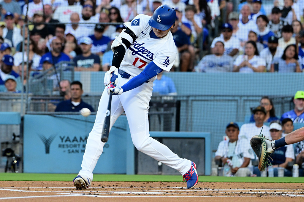 Los Angeles Dodgers Shohei Ohtani (17) hits solo home run against the Seattle Mariners during the first inning of a baseball game Tuesday, July 28 2026, in Los Angeles. (AP Photo/Wally Skalij)