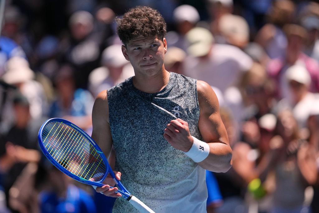 Ben Shelton of the U.S. reacts after defeating Dane Sweeny of Australia during their second round match at the Australian Open tennis championship in Melbourne, Australia, Thursday, Jan. 22, 2026. (AP Photo/Asanka Brendon Ratnayake)