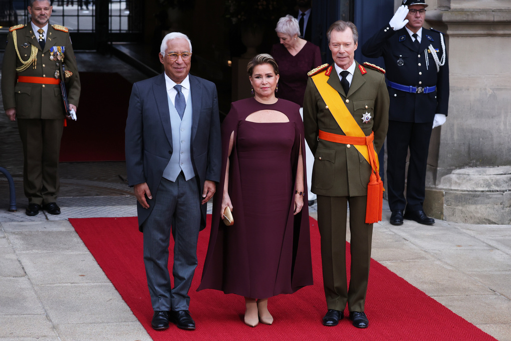 European Council President Antonio Costa, left, is greeted by Luxembourg's Grand Duke Henri, right, and Grand Duchess Maria Teresa as he arrives for the abdication and enthronement ceremony of the Grand Duke of Luxembourg at the Grand Ducal Palace in Luxembourg, Friday, Oct. 3, 2025. (AP Photo/Omar Havana)