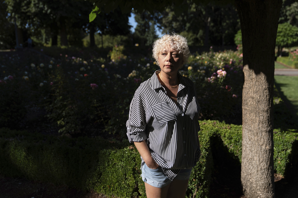 Brianna Wheeler poses for a photo at Peninsula Park, Monday, Sept. 22, 2025, in Portland, Ore. (AP Photo/Jenny Kane)