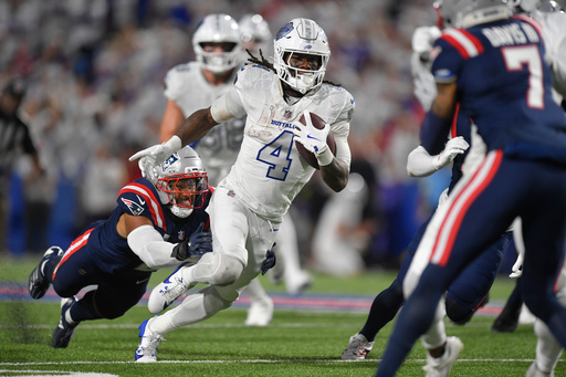 Buffalo Bills running back James Cook (4) runs past New England Patriots linebacker Harold Landry III (2) during the second half of an NFL football game, Sunday, Sept. 5, 2025, in Orchard Park, N.Y. (AP Photo/Adrian Kraus) Buffalo Bills running back James Cook (4) runs past New England Patriots linebacker Harold Landry III (2) during the second half of an NFL football game, Sunday, Sept. 5, 2025, in Orchard Park, N.Y. (AP Photo/Adrian Kraus)