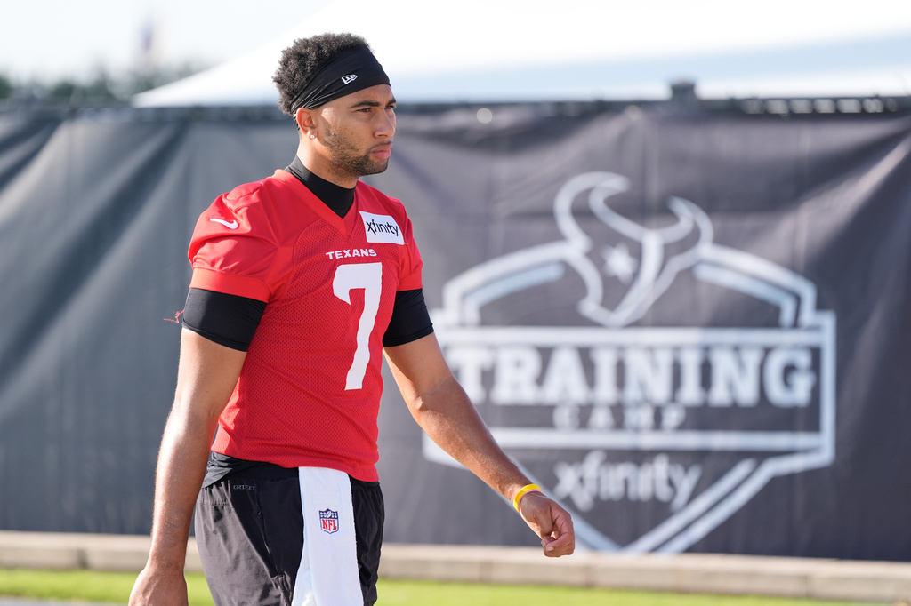 Houston Texans quarterback C.J. Stroud (7) arrives for the team's NFL football training camp in Houston, Wednesday, July 29, 2026. (AP Photo/Ashley Landis)